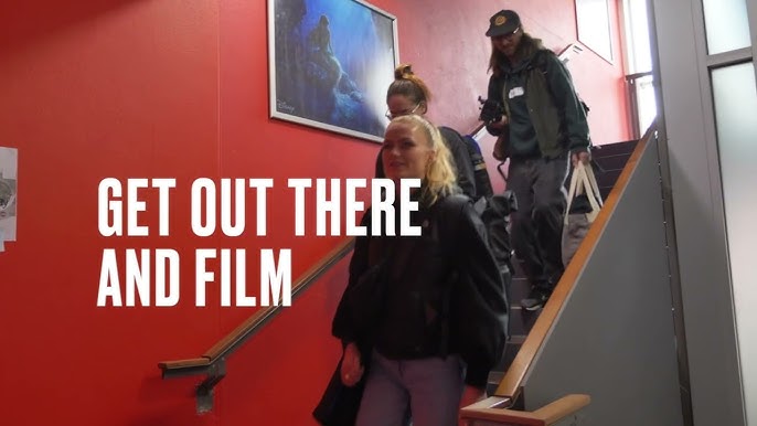 three people walking down stairs behind the text reading: "get out there and film"